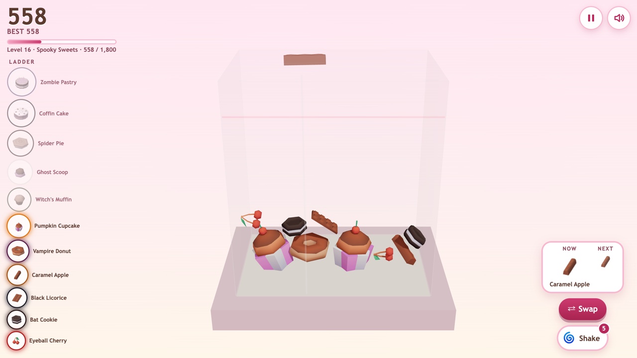 Level 16, Spooky Sweets: cupcakes, cookies, a donut, candy bars and cherries in the case, with the Halloween ladder from Eyeball Cherry up to Zombie Pastry on the left and a Caramel Apple held on the right.