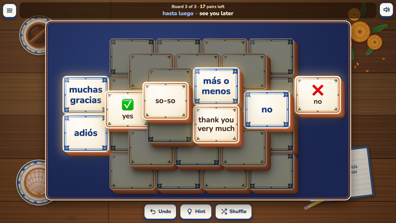 Board 3's four layers, each one a step up and to the left of the one below, with 17 pairs left and hasta luego · see you later just taken in the status bar. Bright free tiles include muchas gracias and thank you very much, más o menos and so-so, adiós, yes, and no on both a Spanish and an English tile.